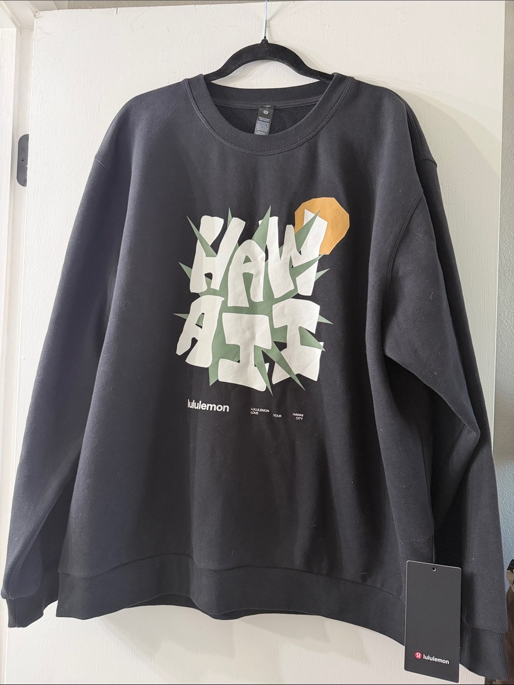 lululemon athletica Black Crewneck Sweater with White, Green & Gold Graphic